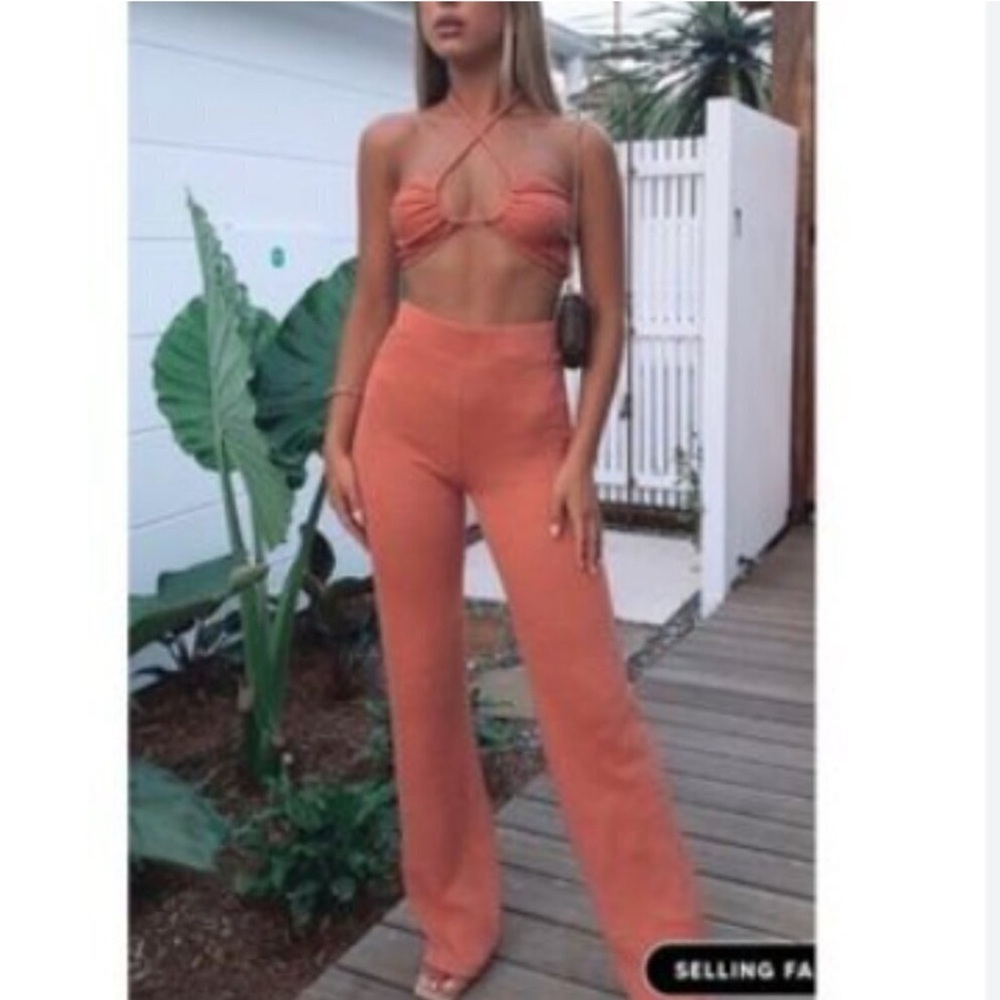 White Fox Boutique Unconditional Knit Flare Pants in Terracotta. Size M